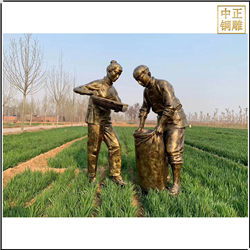 夫妻收麥子人物(wù)銅雕塑