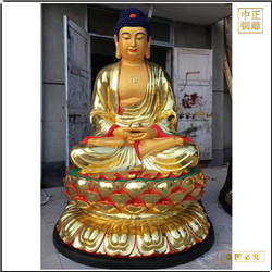 大(dà)型貼金釋迦牟尼佛雕像